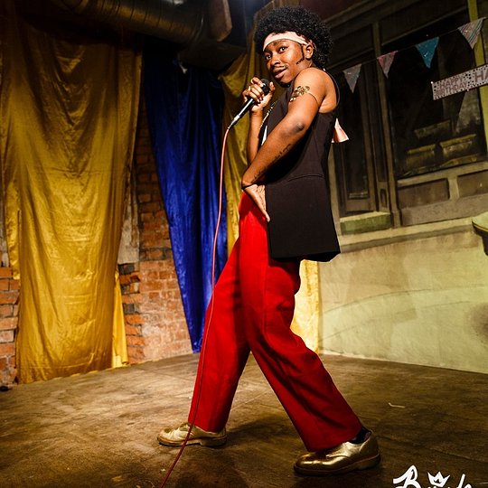 Live performance by a drag king