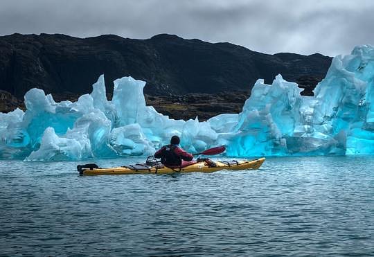 Kayak with Icebergs